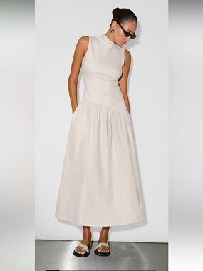Marcella Hutton High-Neck Cream Maxi Dress with Gathered Skirt $213 USD